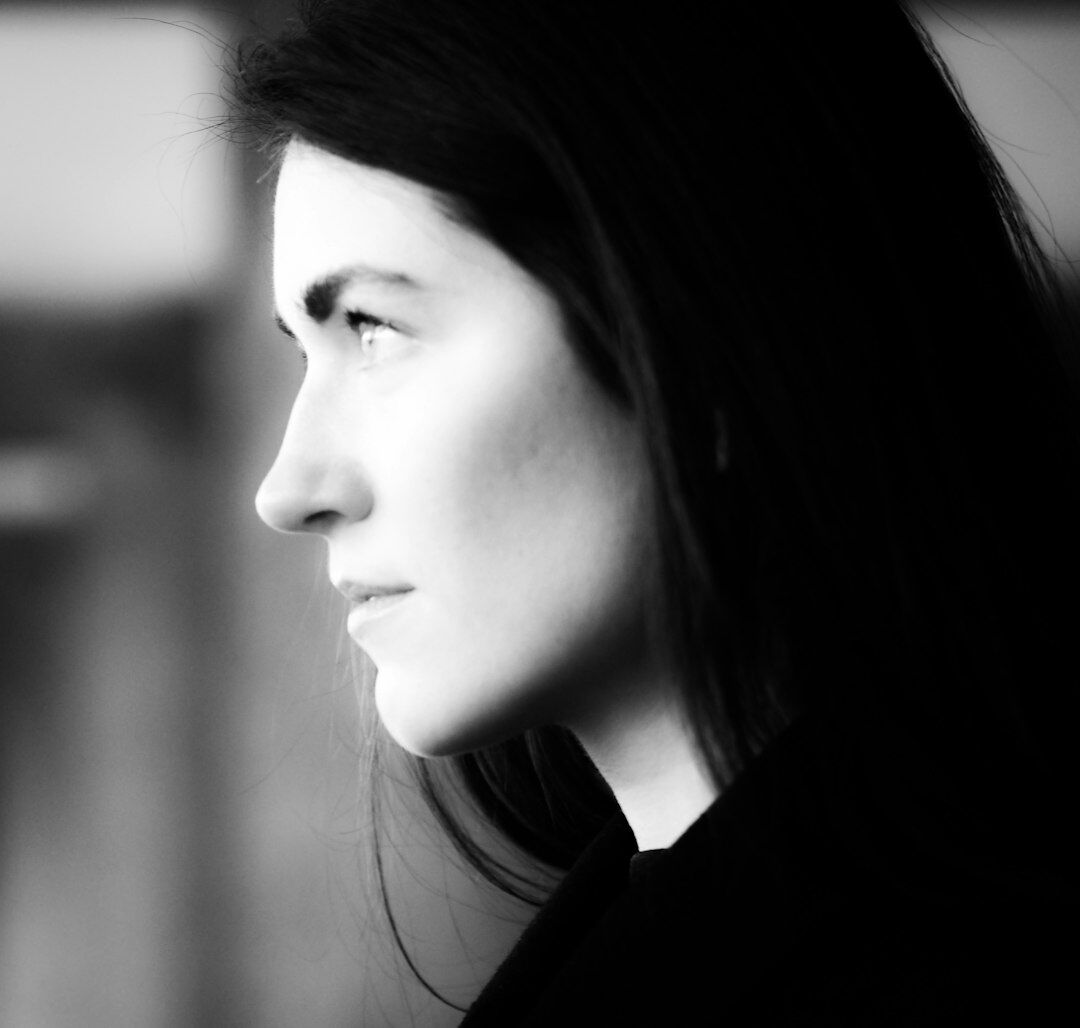 Studio portrait of a Chilean female journalist smiling